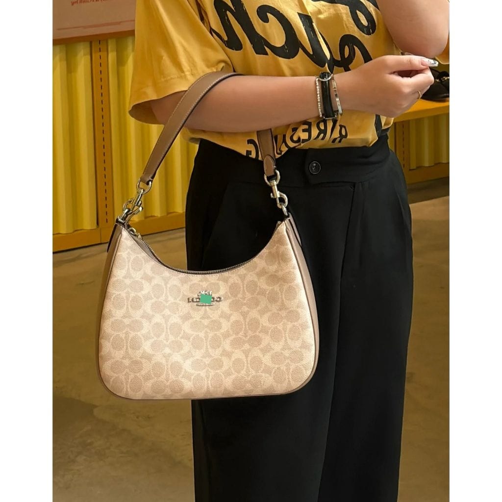 Monogram Curve Hobo β Signature Print Collection