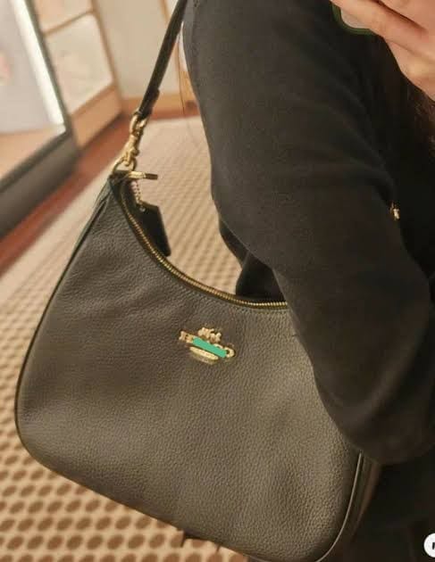 Monogram Curve Hobo β Signature Print Collection