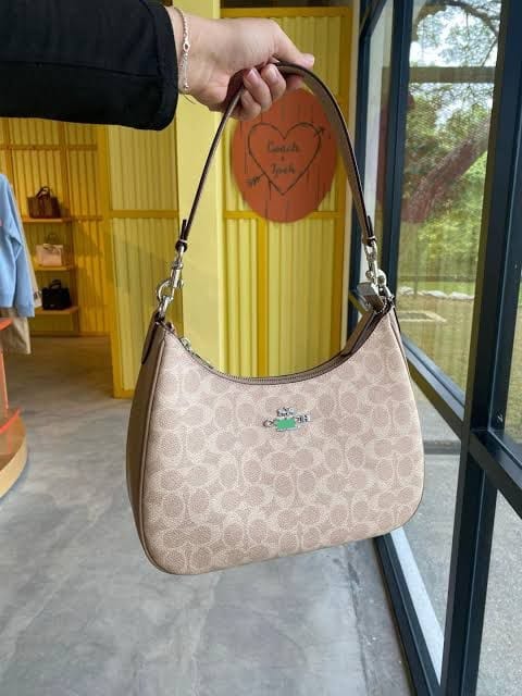 Monogram Curve Hobo β Signature Print Collection