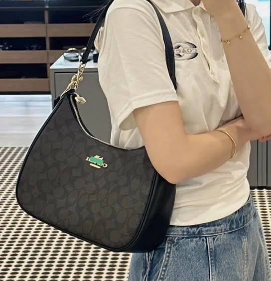 Monogram Curve Hobo β Signature Print Collection