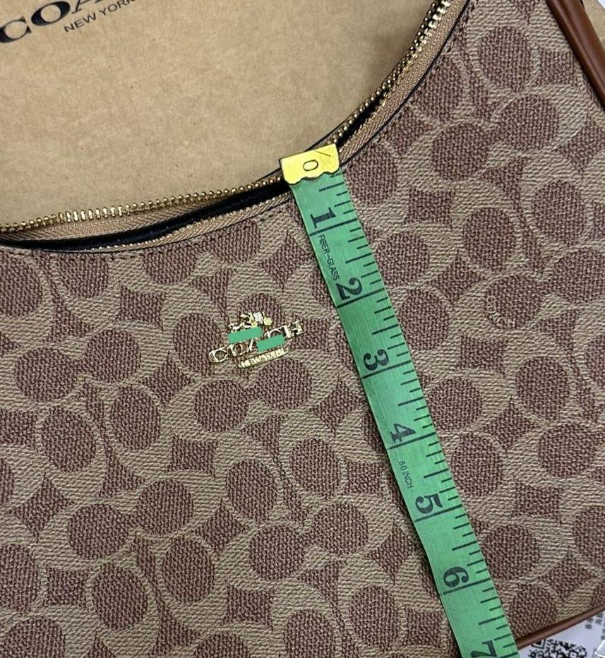 Monogram Curve Hobo β Signature Print Collection
