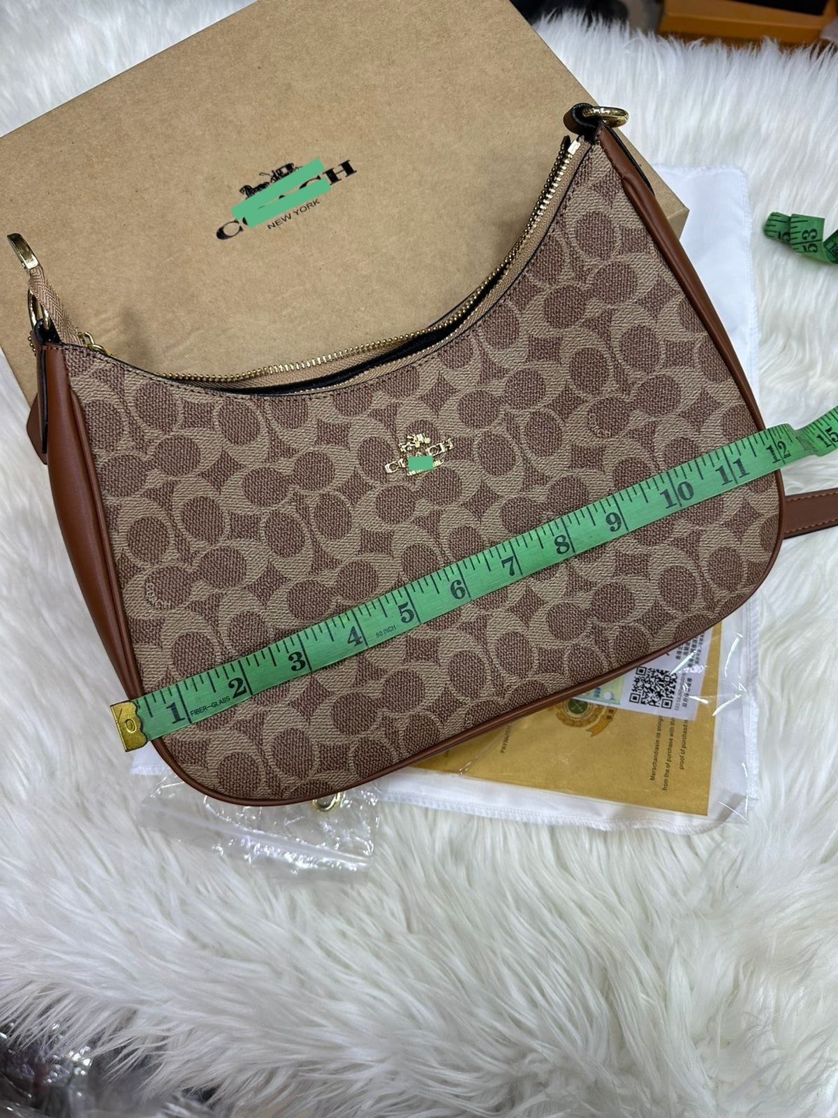Monogram Curve Hobo β Signature Print Collection