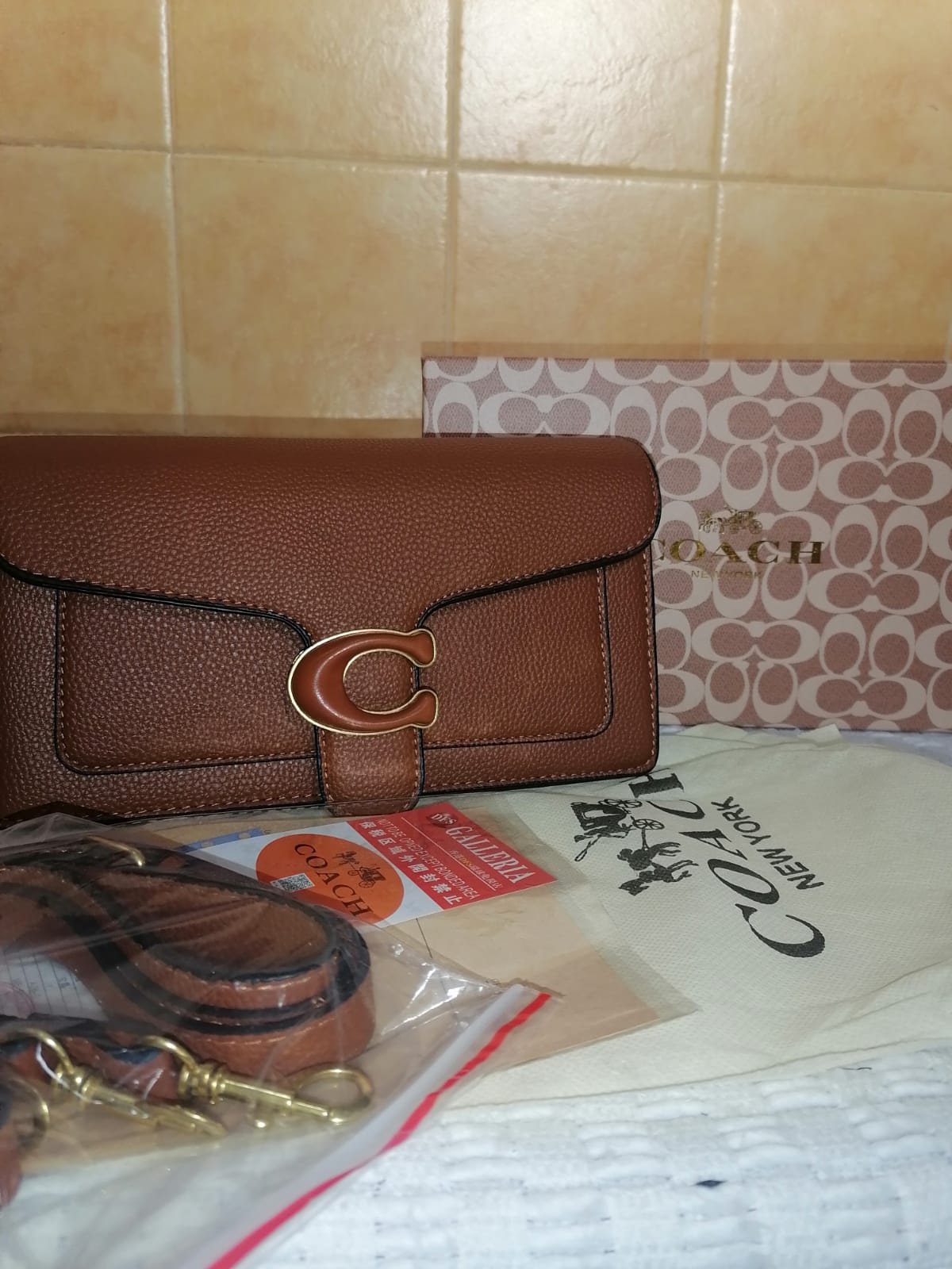 Coach Leather Crossbody Bag with Signature C Buckle - Shaszelle Collection