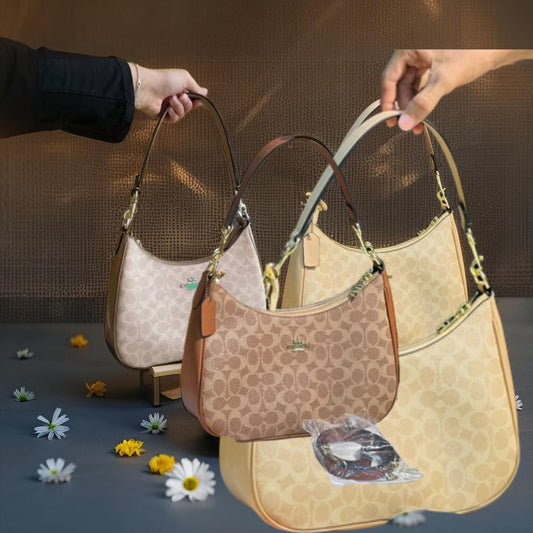 Monogram Curve Hobo β Signature Print Collection